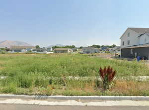 View of yard with a mountain view