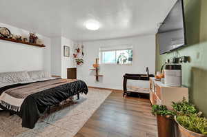 Bedroom featuring hardwood / wood-style flooring