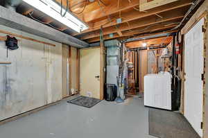 Basement with washer / clothes dryer and heating unit