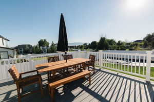 Wooden terrace featuring a mountain view