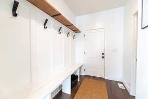 Mudroom featuring dark hardwood / wood-style flooring