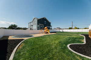 View of yard with a playground