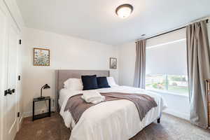 View of carpeted bedroom