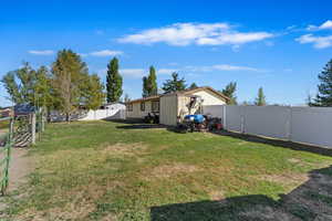 View of yard with a shed