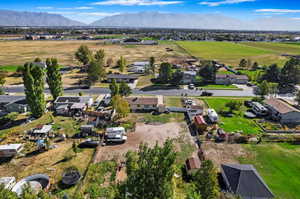 Birds eye view of property with a mountain view