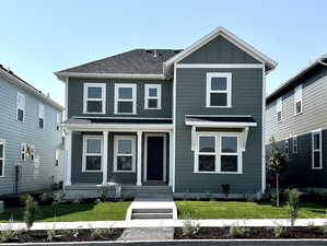 View of front of house with a front lawn