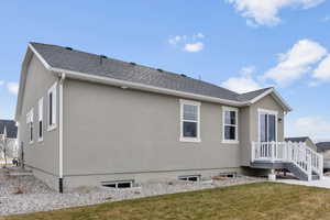 View of home's exterior with a lawn