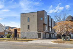 View of building exterior with a garage