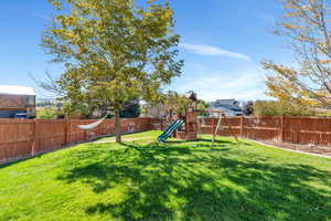 View of yard with a playground