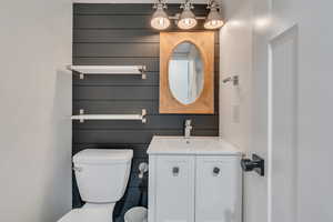 Bathroom with vanity and toilet