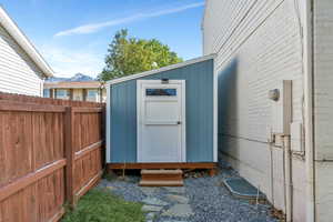 View of outbuilding featuring a mountain view