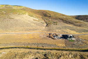 Birds eye view of property with a mountain view