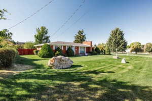 View of front facade with a front yard