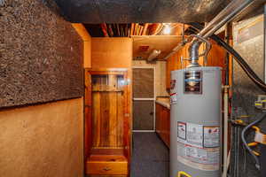 Utility room with gas water heater