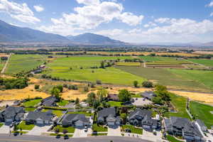 Birds eye view of property featuring a mountain view and a rural view