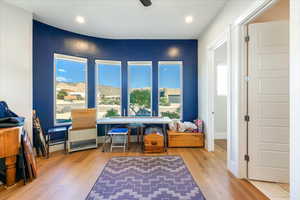 Sitting room featuring hardwood / wood-style floors