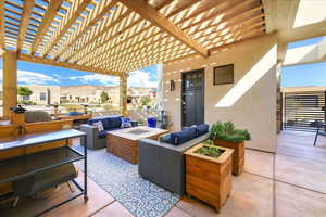 View of patio / terrace with outdoor lounge area, a mountain view, grilling area, and a pergola