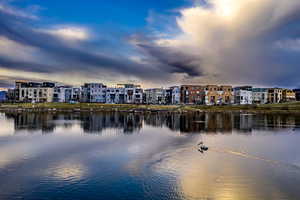 Situated on the waterfront of Oquirrh Lake, this townhome neighborhood invites you to walk, bike, kayak, paddle board, bird watch and enjoy a healthy lifestyle in a welcoming setting.