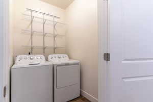 The laundry room is a coveted feature of this Sego floor plan. Rather than the laundry closet typical of many townhomes, this room allows for laundry sorting, hanging, and storage to happen all behind this door. The washer and dryer are negotiable.