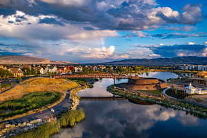 Just across the foot bridge is a whole world of various villages, each with its own vibe. Each connected by trails, minutes from parks, play areas, pools, and water sports.