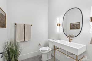 Bathroom featuring toilet and sink