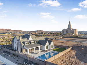 Birds eye view of property featuring a mountain view