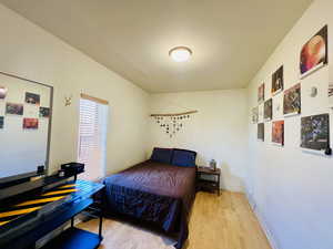 Bedroom featuring light hardwood / wood-style flooring