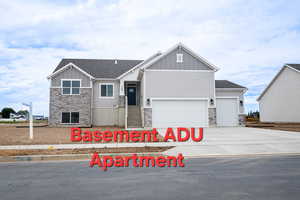 View of front of house with a garage