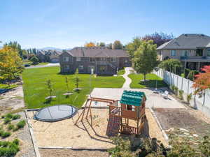 Exterior space featuring a Playground and a built-in Sandbox