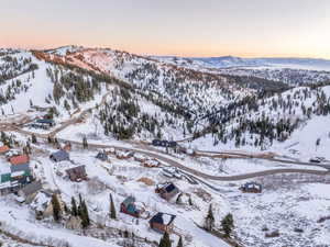 Snowy aerial view with a mountain view