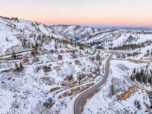 Snowy aerial view with a mountain view