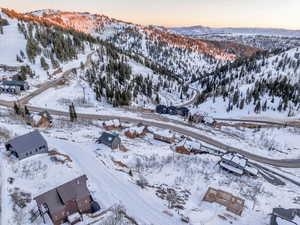 Snowy aerial view with a mountain view