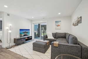 Living room featuring light hardwood / wood-style flooring