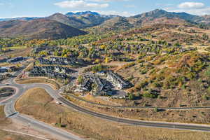 Birds eye view of property with a mountain view