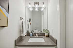 Bathroom with vanity and toilet