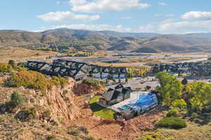 Birds eye view of property featuring a mountain view