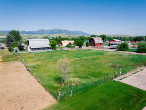 View of yard with a mountain view and a rural view