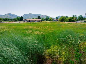 View of mountain feature with a rural view