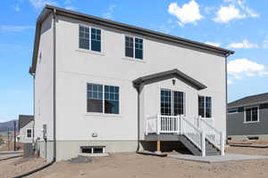 Rear view of property with central air condition unit