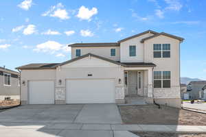 View of front property featuring a garage