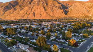 Birds eye view of property with a mountain view