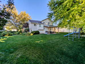 View of yard with a patio area