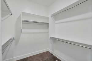 Walk in closet featuring carpet