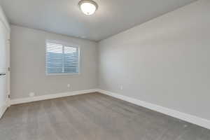 View of carpeted spare room