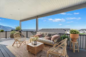 Deck with a mountain view and an outdoor area perfect for entertaining.