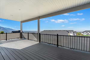 Wooden deck featuring a mountain view