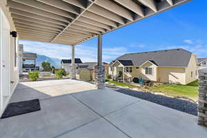 View of patio featuring a mountain view