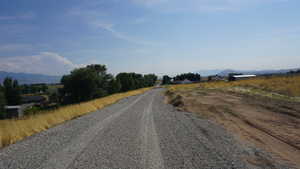 View of street featuring a mountain view and a rural view
