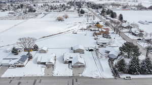 Snowy aerial view with a residential view