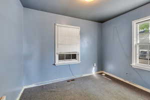 Bedroom room featuring carpet flooring